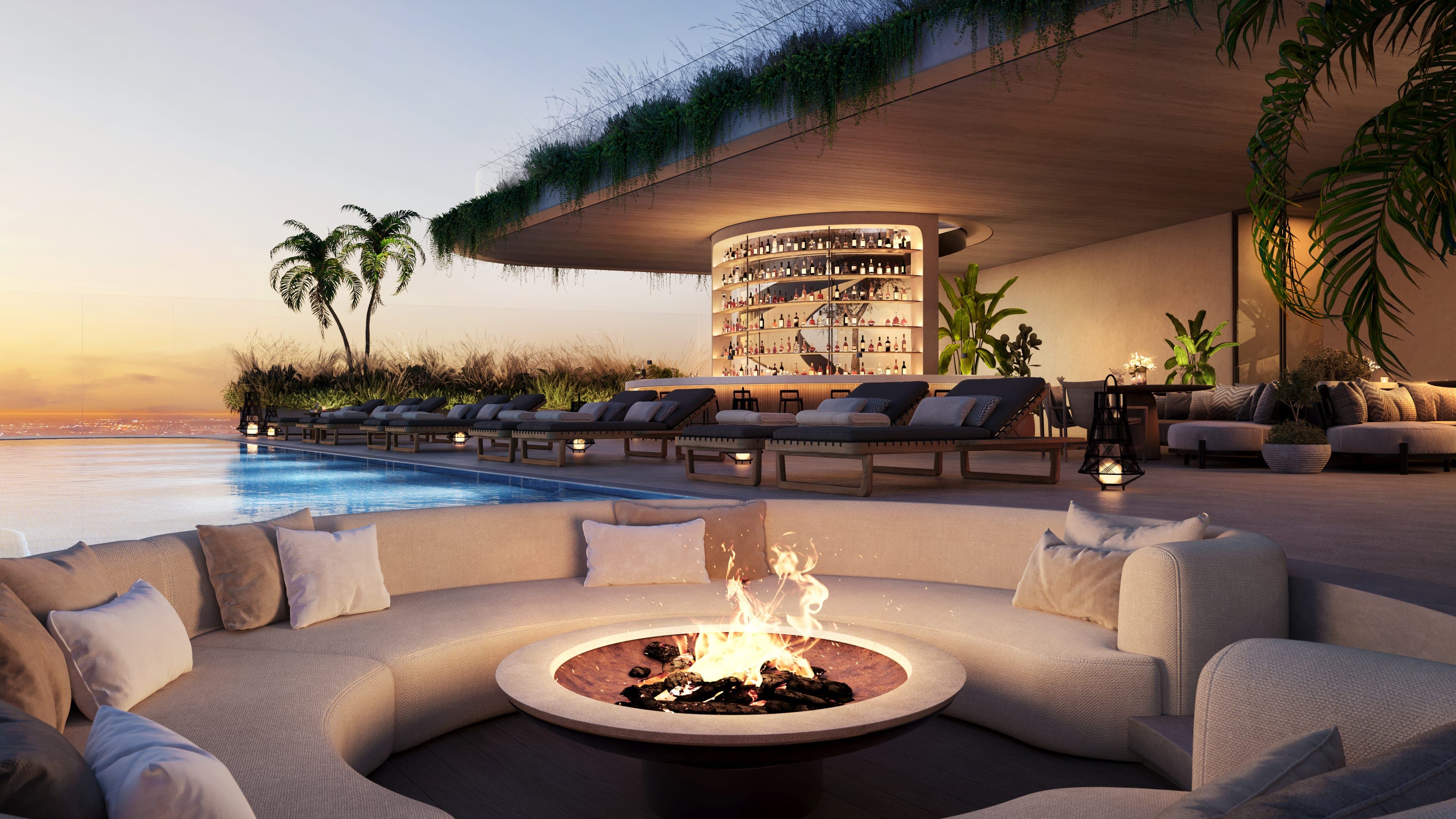 Rooftop firepit lounge with pool and bar at dusk — artist's conceptual rendering
